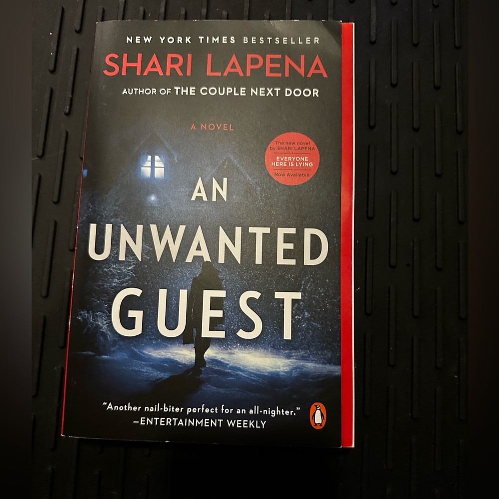 An Unwanted Guest Book by Shari Lapena